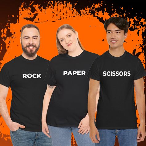 🎃✂️ Rock Paper Scissors Halloween Costume T-Shirts! Perfect for a funny 3-person group costume. Get matching tees and win Halloween with this hilarious trio! 😂👕⁠ ⁠ 👉 https://pinbackerz.etsy.com/listing/1806943857/rock-paper-scissors-halloween-costume-t⁠ ⁠ FOLLOW ➡️ @pinbackerz⁠ ⁠ #GroupCostume #HalloweenTee #MatchingCostume #Pinbackerz 3 Person Costume, Scissors Costume, Rock Paper Scissors Costume, Halloween Trio, Matching Trio, Trio Costumes, Funny Costume, Funny Matching, Matching Costumes