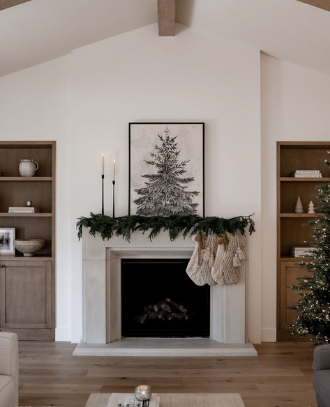 Neutral and classic Christmas decor for your living room and fireplace mantel. Neutral Christmas Fireplace Decor, Art Titles, Classic Christmas Decor, Christmas Living Room Decor Ideas, Christmas Living Room Decor, Wood Fireplace Mantel, Classic Christmas Decorations, Cozy Christmas Decor, Christmas Living Room