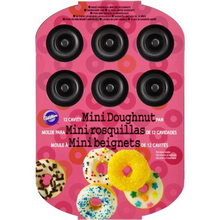 Wilton 12-Cavity Mini Doughnut Pan 2105-0614 Baked Doughnut Recipes, Donut Baking Pan, Donut Pan, Doughnut Pan, Mini Doughnuts, Marshmallow Fondant, Icing Colors, Baking Utensils, Doughnut Recipe