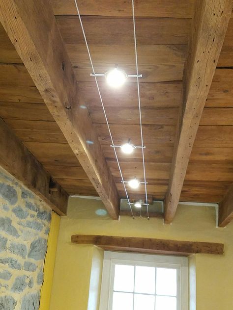 Lights For Beamed Ceilings, Lights Hanging From Ceiling Beams, Exposed Beams Lighting Ideas, Lighting For Open Beam Ceilings, Lights On Beams Ceilings, Exposed Beam Lighting, Exposed Beams Ceiling Lighting, Wood Beam Ceiling Lighting, Basement Lighting Exposed Ceiling