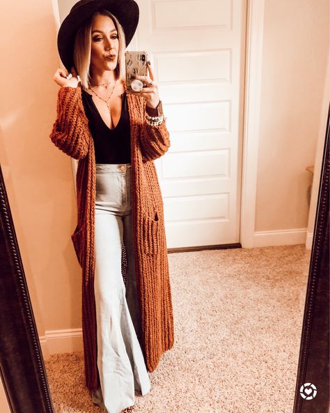 Boots And Bell Bottoms Outfit, Long Sleeve Shirt With Bell Bottoms, Mid Size Bell Bottoms Outfit, Sweater And Bell Bottom Jeans, Fall Outfits Long Cardigan, Courdory Bell Bottoms Outfit, Winter Bell Bottoms Outfit, Bell Bottoms Outfit Fall, Brown Bell Bottoms Outfit