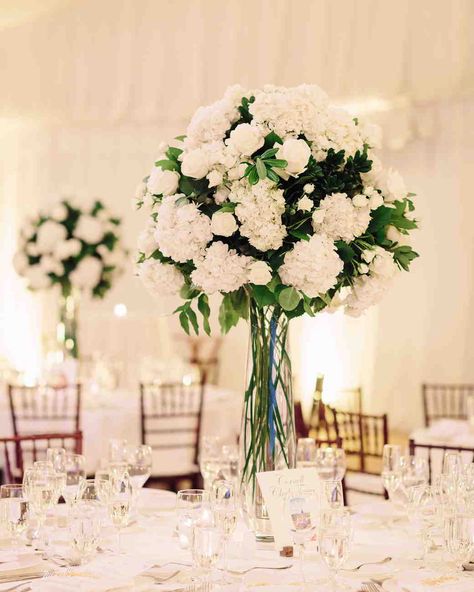 32 Classic Wedding Centerpieces We Love #WeddingFlowers #WeddingCenterpieces #WeddingReception #WeddingDecor | Martha Stewart Weddings - 32 Classic Wedding Centerpieces We Love Classic Wedding Centerpieces, Rose Centerpiece, Winter Wedding Colors, Unique Wedding Flowers, Wedding Floral Centerpieces, Wedding Centerpieces Diy, Flower Centerpieces Wedding, Martha Stewart Weddings, Wedding Flower Arrangements