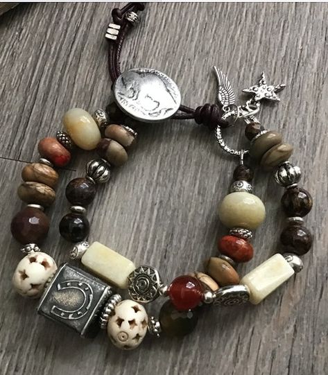 NorthernLitesJewelry on Etsy: adjustable bracelet with 1/2" sterling silver Anne Choi "Lucky Cube" focal bead with four-leaf clover, butterfly, horseshoe, and frog; together with rondelle- and tube-shaped bronzite, carnelian, amazonite, emperor jaster, red creek jasper, agate, dragon vein, bone, Thai Karen Hill Tribe silver beads, and sterling star and feather charm dangles, with a buffalo nickel button closure (US $89, January 2023) Red Creek Jasper, Buffalo Nickel, Hill Tribe Silver, January 2023, Feather Charms, Paper Beads, Bead Stringing, Four Leaf Clover, Focal Bead