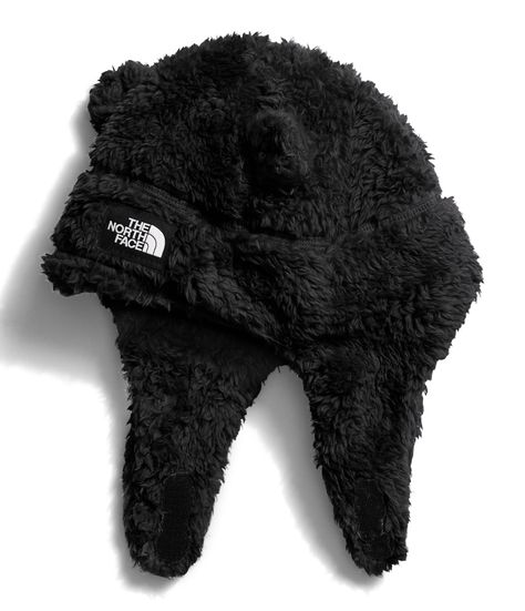 PRICES MAY VARY. Hook and Loop closure Machine Wash WINTER CLASSIC. With the Baby Bear Suave Oso Beanie, your little one has all the comforts of the full-sized model, but it also has bear ear details and a chin strap to help it stay in place. STAYS IN PLACE. Featuring a hook-and-loop chin strap, this hat stays in place while they're out taking their first steps in the snow. WARM COVERAGE. Ultra-warm and cozy, this hat for babies is made with soft raschel fleece fabric made with 100% recycled pol The North Face Baby, Arte Bob Marley, Beanie Baby Bears, North Face Brand, Black Month, North Face Kids, Patches Fashion, Bear Ears, Baby Bear