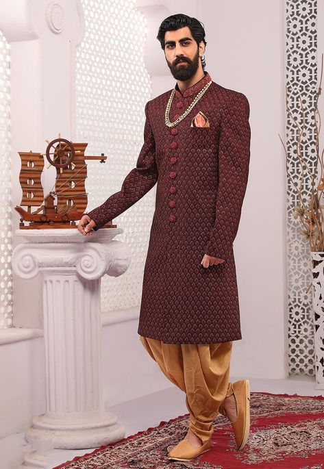 Velvet Sherwani in Maroon This Readymade Attire is Highlighted with Buttons, Resham and Sequins Work. Crafted in Chinese Collar and Full Sleeves Available with an Art Dupion Silk Dhoti Pant in Beige Do note: Kanthimala and Footwear shown in the image is for presentation purposes only. Half to one inch may vary in measurement. (Slight variation in actual color vs. image is possible) Maroon Sherwani, Velvet Sherwani, Dhoti Sherwani, Mens Sherwani, Sherwani For Men, Party Jackets, Dhoti Pants, Embroidered Velvet, Utsav Fashion