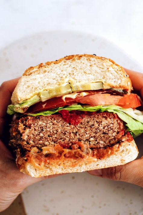 We’ve shared many veggie burgers over the years, but this one takes the burger, or the cake, or the burger cake! (Burger cake recipe idea, noted). We examined all of our past recipes, tried to dissect the flavor of beef, and got very scientific about this burger. We considered the texture, the flavor, the aroma, and the complexity of every ingredient added. If it wasn’t adding something special or amazing, we tossed it. The BEST Vegan Burger (GF, Soy-Free) from Minimalist Baker → Best Vegan Burger, Veggie Burgers Recipe, Minimalist Baker, Burger Toppings, Baked Garlic, Vegan Burger, Vegan Burgers, Sauteed Veggies, Burger Recipe