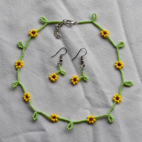 Get yours at @palkav.in on Instagram Seed Bead Jewelry Diy Daisy Chain, Daisy Chain Seed Bead Tutorial, Sunflower Seed Bead Necklace, Bead Daisy Chain, Yellow Flower-shaped Beaded Necklaces With Colorful Beads, Indian Bridal Jewelry Sets, Sunflower Jewelry, Fabric Earrings, Diy Birthday Decorations