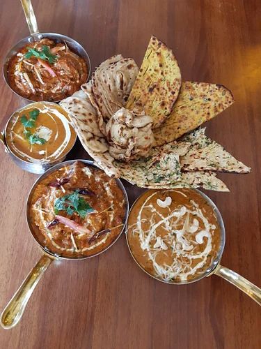 Authentic Punjabi Cuisine At Punjabi Trail | LBB Punjabi Aesthetic, Vegetable Pulao, Punjabi Cuisine, Mint Chutney, Punjabi Food, Hazelnut Chocolate, Kitchen Safety, Paneer Tikka, Palm Jumeirah