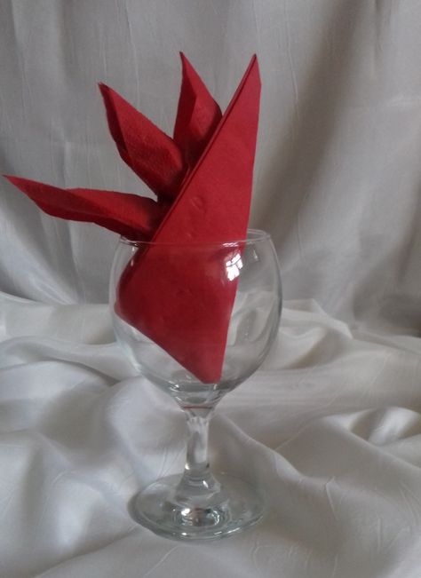 Napkins by PC Creations Leeds. Red Bird of Paradise Napkin Fold in Wine Glass. See more in the 'Napkins' photo gallery. Need a napkin folding service? Get in touch. Bird Of Paradise Table Napkin, Red Bird Of Paradise, Wedding Napkin Folding, Cloth Napkin Folding, Paper Napkin Folding, Napkin Folds, Gala Themes, Red Napkins, Table Dressing