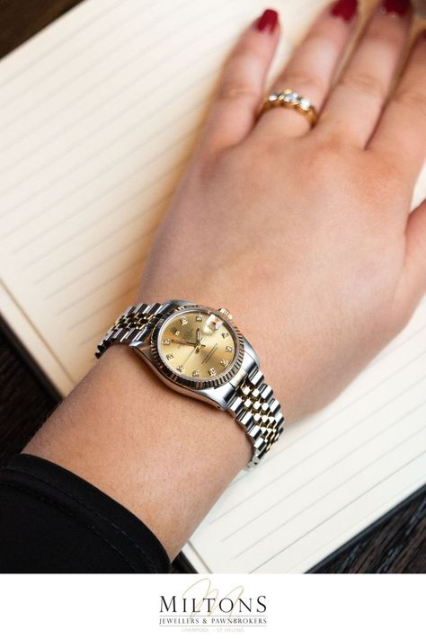 This midsize Rolex Datejust has a 31mm steel watch casing with a yellow gold fluted bezel. The watch casing is water-resistant up to 100m and comes fitted with a steel and gold Rolex Jubilee bracelet. This watch has a champagne coloured dial with diamond hour markers and a date aperture at the 3 o'clock position. Rolex Datejust Women, Rolex Jubilee, Gold Rolex, Wrist Jewelry, Bridal Bangles, 100m, Rolex Datejust, Steel Watch, O Clock