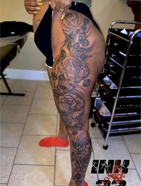 Black Women Sleeve Tattoo Ideas Flowers, Front Leg Tattoo Black Women, Leg Sleeves For Black Females, Woke Tattoo Ideas, Legs Sleeve Tattoo Women, Pretty Thigh Tattoos Black Women, Tattoo Ideas Female Thigh Flowers, Rose Leg Sleeve Tattoo, Thigh And Back Tattoo Women