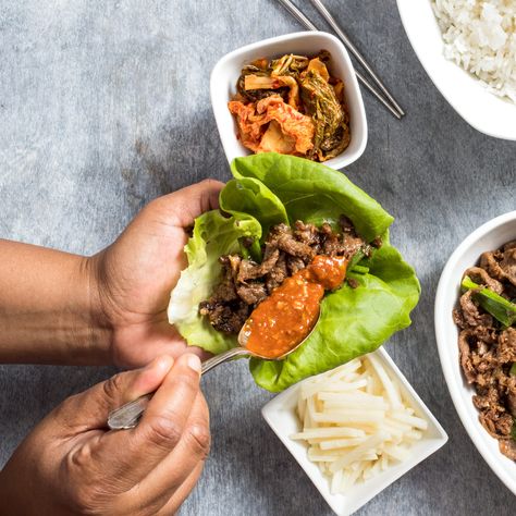 This popular Korean dish features flavorful strips of marinated steak that cook in minutes. Bulgogi is quick enough for a weeknight but also impressive and fun to serve to company. Korean Bbq Grill, Steak And Rice, Donut Toppings, Bulgogi Recipe, Cookie Toppings, Cast Iron Griddle, Bulgogi Beef, America's Test Kitchen Recipes, Marinated Beef