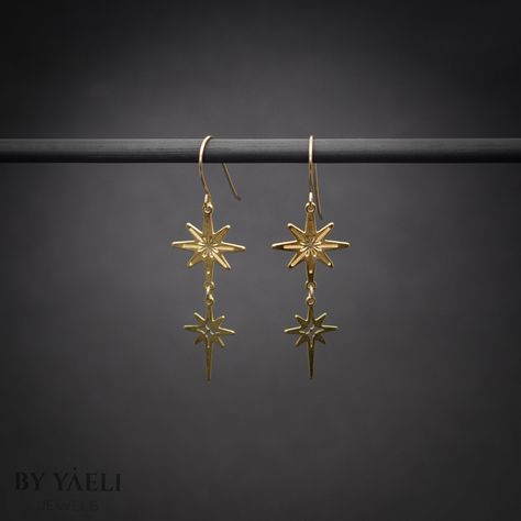 "Celestial earrings - You'll shine when you will wear this celestial dangle earrings.  This north stars earrings is perfect to wear at work, holidays, and even for a party. ★Comes in our signature gift box, ready for gift giving.  ★ Available in Gold [ gold-filled ear wires & gold plated brass ]  ★ Earring size (stars) 1.50\"x0.60\". o Thanks for shopping at ByYaeli♥  All images, texts & products are property of ByYaeli ©2020" Celestial Aesthetic Jewelry, Gold Star Earrings Dangle, Infinite Jewelry, Prince Kaeya, Star Earrings Dangle, Bee Cookies, Stars Earrings, Jewelry Design Studio, Gold Star Earrings