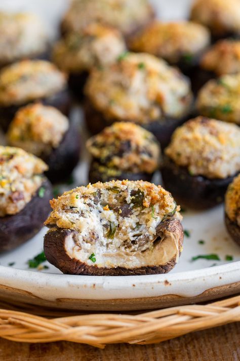 These Vegan Stuffed Mushrooms are the most delicious vegan appetizer! Made with vegan cream cheese and fresh herbs, you'll adore these easy mushroom bites. They're the perfect vegan holiday appetizer and easily made gluten-free!'ll adore these easy mushroom bites. They're the perfect vegan holiday appetizer and easily made gluten-free! Stuffed Mushrooms Cream Cheese, Mushroom Bites, Vegan Stuffed Mushrooms, Salty Recipes, Vegan Appetizer, Holiday Appetizers Easy, Gluten Free Sourdough, Mushroom Burger, Vegan Holiday