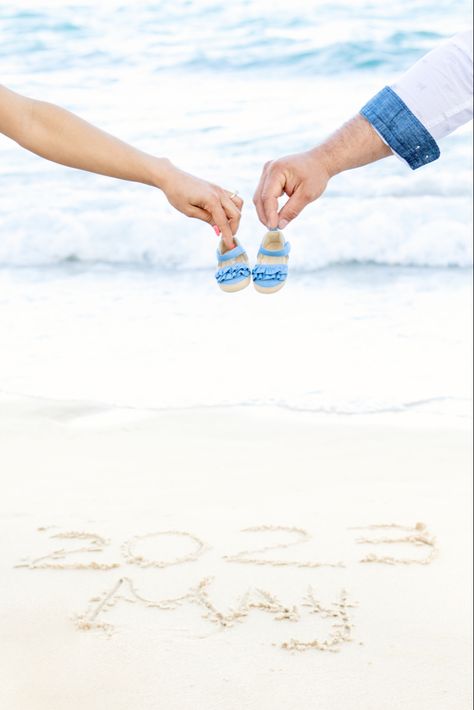 Sunny day, beautiful sky blue water and tiny babygirl shoes in Maternity Photoshoot Gender Reveal Beach Pictures, Gender Reveal At The Beach, Maternity Shoot Beach Ideas, Beach Pregnancy Pictures, Beach Pregnancy Photoshoot, Family Pregnancy Photoshoot, Beach Gender Reveal, Beach Baby Announcement, Maternity Beach Photoshoot