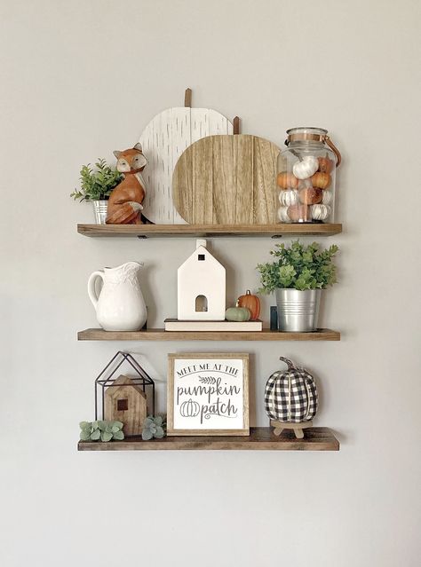 Fall Shelf Styling Living Room, Fall Floating Shelf Decor Ideas, Built Ins Fall Decor, Floating Shelves Fall Decor Ideas, Book Shelf Fall Decor, Fall Bookshelf Decor Living Room, Fall Wall Shelf Decor Ideas, Seasonal Shelf Decor, Floating Shelf Fall Decor