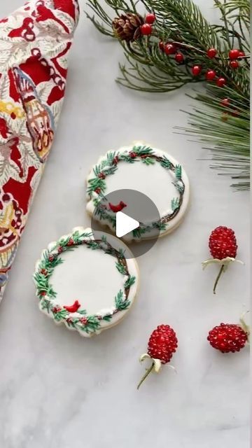 Mary Mansfield on Instagram: "Do you keep your Christmas decorations up long after Christmas? A design like this wreath cookie is perfect all winter long. I’ll share a video showing how I made the cardinal transfers next week. Follow along so you won’t miss it❣️ Cookie tip: watch my previous reel to learn how to pipe pine needles without getting a hand cramp 🌲 #cookiedecoratingvideo #cookietutorial #cookievideo #wreathcookie #christmascookies #royalicing #cardinals #decoratedcookies #royalicingcookies #decoratedsugarcookies #cookiedecorating" Pointsetta Cookies Decorated, Wreath Cookies Royal Icing, Christmas Wreath Cookies Decorated, Wreath Cookies Decorated, Christmas Cookie Decorating Videos, Chritmas Cookies, Christ Centered Christmas Traditions, Royal Icing Christmas Cookies, Christmas Wreath Cookies