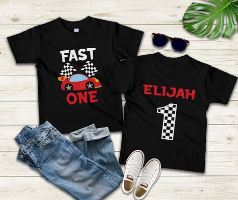 fast one birthday shirt, 1st birthday shirt, race car birthday, custom race car, first birthday shirt, racing birthday, birthday boy shirt *Price listed is for 1 item only. * Click on "Learn more about this item" to read the full description *  Baby Bodysuit Material/Sizing + Ring Spun Cotton + True to size + CPSIA compliant tracking label in side seam Infant / Toddler Tee Material/Sizing + Ring Spun Cotton + True to size + CPSIA compliant tracking label in side seam 3/4 Raglan Tee Material/Sizing + Infant raglan tees runs  smaller compared to our Infant regular tees, we do recommend sizing up + Toddler / Youth raglan tees are ring spun cotton and are true to size Youth Tee Material/Sizing + Ring Spun Cotton + Runs smaller, we do recommend sizing up for a looser fit Adult Unisex & Women's Fast One Birthday Shirt, 1st Birthday Fast One, Race Car One Year Birthday, Fast One Birthday Outfit, The Fast One First Birthday, Fast One Birthday, Two Fast Birthday Shirt, First Birthday Shirt Boy, Fast One Birthday Party