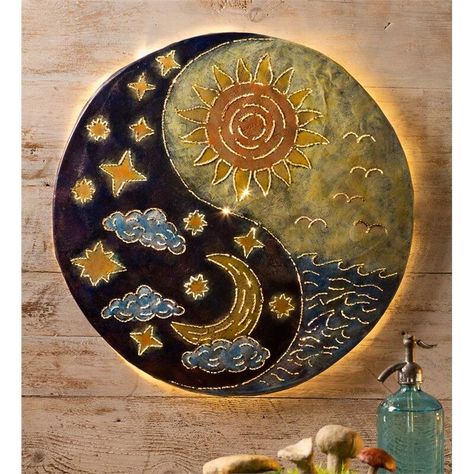 You won't find this handcrafted glowing sun and moon Yin Yang metal wall art anywhere else. This wall art features unusual glow and intriguing craftsmanship. Made from a recycled metal drum, lighted Yin Yang wall décor is complete with a crescent moon in a starry night sky and a midday sun over ocean waters. During the day, this colourful day and night scene will be a stunning focal point for any indoor or outdoor setting. On the wall light's reverse side are small spokes for stringing the inclu Moon Yin Yang, Yin Yang Wall, Tattoo Moon, Yin Yang Art, Yin Yang Tattoos, Outdoor Metal Wall Art, Art Hippie, Led Wall Art, Yoga Decor