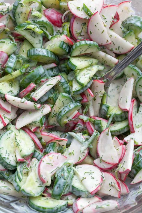 Cool off with a refreshing cucumber radish salad tossed in a light and creamy yogurt dill dressing. Perfect for hot summer days and grilling!