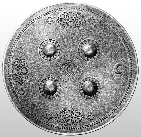 Indian dhal (shield, 19th century, steel, gold, silk-velvet, Diam. 14 3/4 in. (37.47 cm); Wt. 2 lb. 14 oz. (1304 g), Met Museum. Probably from Lahore, this is a virtuoso demonstration of koftgari, or counterfeit damascening. In this technique, the steel is crosshatched with files, and designs cut from gold or silver foil or wire are applied to the rough area and burnished in place. Persian Shield, Pale Horse, Persian Art, Memorial Museum, Royal Academy Of Arts, Classic Image, Armors, Zombie Apocalypse, Museum Collection