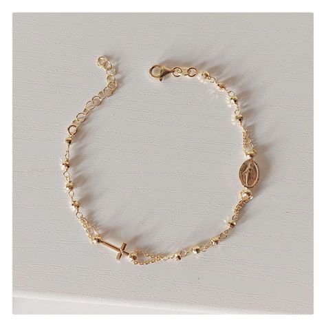 This beautiful rosary bracelet is made of gold plated silver, with cross and Miraculous Medal.  This beautiful elegant bracelet is an ideal gift for Catholic women on all occasions.  If you want to have a bracelet with a deeper meaning, this one is ideal for you Due to its simplicity, it can be worn every day and is easily combined with other jewelry. Lenght of bracelet is 18 plus 3 cm.  Diametar of beads: 4 mm For any religious occasions. If you want to see the rest of our selection of beautiful bracelets, follow this link: https://www.etsy.com/shop/MedjugorjeJewelry?ref=shop_sections_curr&listing_id=1344945334§ion_id=40313966#items ...Or more of our other jewelry:  https://medjugorjejewelry.etsy.com Mother Mary Bracelet, Beautiful Rosary, Dope Jewelry Accessories, Catholic Women, Deeper Meaning, Beautiful Bracelets, Catholic Jewelry, Rosary Bracelet, Dope Jewelry