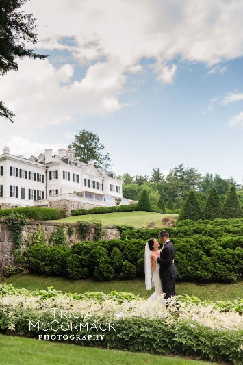 A wide shot of a bride and groom standing on the garden grounds of the Edith Wharton estate in The Berkshires, with the grand historic mansion in the background. The Mount Edith Wharton Wedding, Berkshire Wedding, Grand Architecture, Enchanting Wedding, Edith Wharton, The Berkshires, Breathtaking Wedding, Lush Garden, Photography Services