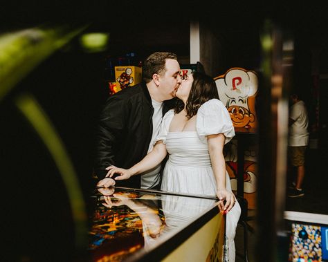 We LOVE when couples introduce us to new places! Ashley + Lawson picked the most unique location for their engagement photos 👾🎮🕹️ As soon as you step inside, the vintage pinball machines, neon lights, and classic video games bring on a huge wave of nostalgia! The arcade vibe made their session feel SO light-hearted and cozy, and allowed them to actually focus on having fun together.💕 TLDR, these two were a blast, and we cannot wait to deliver their full gallery! P.S., definitely adding t... Arcade Wedding Photos, Arcade Engagement Photos, Date Night List, Arcade Couple, Arcade Photography, Fun Engagement Photos, Gainesville Florida, Pinball Machines, Classic Video