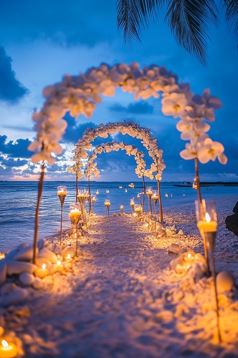 Wedding beach setup. Shell arch surrounded by tiki torches and floating white flowers.

Are you dreaming of a beachfront wedding ceremony enveloped in the sheer beauty of the sun, sand, and sea? Let us transport you to an ethereal world of oceanic allure as we delve into 25 spectacular Beach Wedding Ceremony Design Concepts that are sure to make your heart skip a…

Read more: https://tastywed.com/generated-post-25-romantic-beach-wedding-ceremony-design-concepts/ Beach Wedding Entrance Decorations, Dream Wedding Reception Beach, Beach Wedding Lounge Area, Weddings On A Beach, Diy Beach Wedding Bouquet, Terracota Beach Wedding, Fantasy Beach Wedding, June Beach Wedding Colors, Cute Beach Wedding Ideas