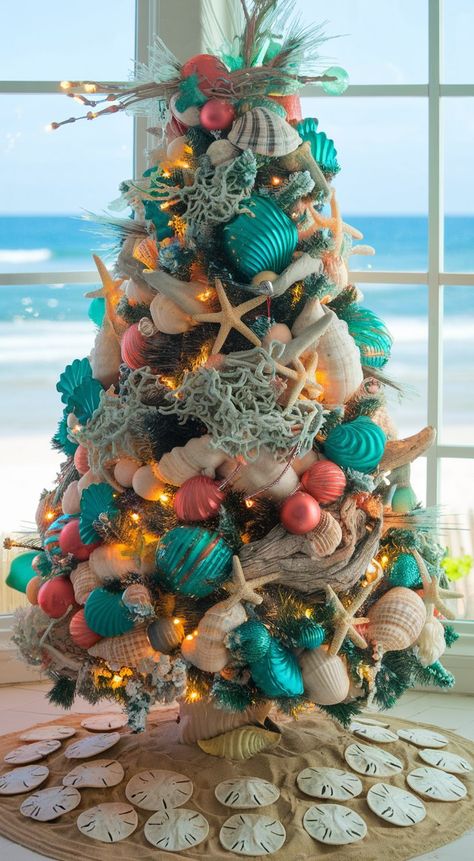 11 Beautiful Christmas Tree Designs Beach Christmas Tree Topper, Summer Christmas Tree Ideas, Beach Theme Christmas Tree Ideas, Under The Sea Christmas Tree, Summer Tree Decorations, Beach Theme Christmas Tree, Beach Theme Christmas, Nautical Christmas Tree, Beach Christmas Tree