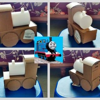 Thomas the Train Costume: 8 Steps (with Pictures) Cardboard Engineering, Thomas The Train Costume, Cardboard Train, Train Valentine, Train Costume, Cardboard Ideas, Thomas Birthday Parties, Thomas The Train Birthday Party, Kids Valentine Boxes