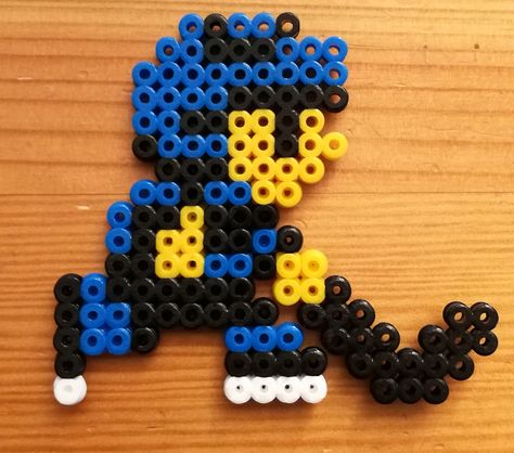 Blue player from Ice Hockey [NES] Perler Beads Hockey, Perler Beads Sports, Hockey Perler Beads, Nintendo Perler, Melty Bead Patterns, Graph Crochet, Fuse Bead Patterns, Diy Perler Bead Crafts, Melty Beads