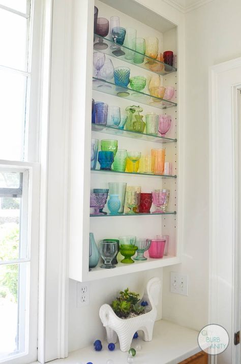 DIY rainbow glass collection Rainbow Glass Collection, Bar Cart Colorful Glasses, Colored Glass Shelf, Kitchen Glassware Display, How To Display Glassware, Colored Glass Collection, Rainbow Glassware, Glassware Display, Colorful Glassware