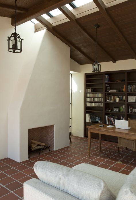 Custom skylights allow natural light to pour into the home office giving the room the feel of an outdoor space. Modern Adobe House, Modern Adobe, Adobe Home, Spanish Modern, Historic Renovation, Adobe House, Pergola With Roof, Courtyard House, Modern Home Office