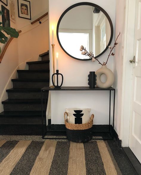 neutral black and cream entryway with striped jute rug, round black rimmed mirror, and collection of vases on console table including a cream donut vase // fort & field Black Console Table Decor, Black And Cream Living Room, Donut Vases, Hallway Decorating Ideas, Small Console Table, Corner Decoration, Cream Living Rooms, Wall Corner, Black Console Table