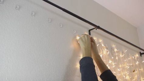 Whether you're lacking light or you're looking to add something special to your room, this project is easy to accomplish and comes out looking magical. Christmas Lights In Room, Diy Headboard With Lights, Christmas Lights In The Bedroom, White Curtain Rod, Fairy Light Curtain, Diy Christmas Lights, Hanging Christmas Lights, Headboard With Lights, Diy Lampe