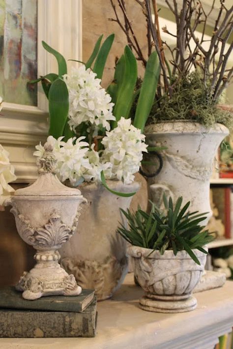 Welcome spring into your home with these spring mantle decor ideas. From farmhouse spring mantels to rustic spring decorating ideas for the mantel, there are plenty of easter mantel ideas to choose from. French Country Mantle, Cloche Ideas, Easter Mantel, Spring Mantle Decor, Easter Mantle, Farmhouse Mantle, Spring Decorating Ideas, White Urn, Spring Mantle