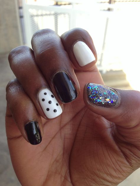 Black and white gel nails with a polka dot accent nail and glitter on the thumb. I wanted to keep it semi-simple Black And White Gel Nails, White Short Nails, White Gel Nails, Accent Nail, Accent Nails, White Short, Short Nails, Art Designs, Nail Art Designs