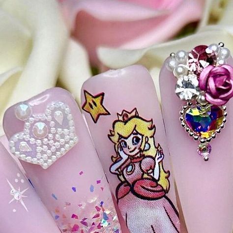 Michelle Lee on Instagram: "Princess Peach by the clever @gelled_pretty 🍑 #nailart #naildesign #nailtrend #viralnailtrend #trendingnailart #nailsofinstagram #nailmagazine #nails #acrylicnails #gelnails #nailstoinspire #nailartclub #nailjunkie #nailtrend #nailporn #cutenails #glitternails #nailgoals #nailed #nailswag #clawaddict #nailinspo #nailinspiration #christmasnails #getnailed #stilettonails #almondnails #coffinnails 👉🏻 For more nail art inspiration, see Pinterest link in bio" Princess Peach Nail Art, Princess Peach Nails, Peach Nail Art, Pro Nails, Michelle Lee, Peach Nails, Anime Nails, Nail Art Inspiration, Nails Magazine