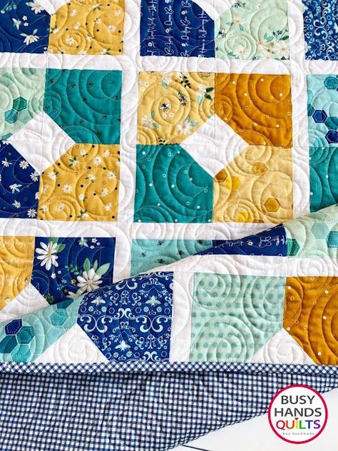 This quick and easy pattern is perfect for a baby quilt and uses charm squares to create a unique and beautiful finished look. Sew a little love in your life and create a stunning quilt that will be cherished and enjoyed for years to come. Quilts Using 5 Inch Squares Patterns, Squares Quilt Pattern Simple, Modern Charm Pack Quilt Patterns, Charm Square Quilts Easy, Quilts Made With 5 Inch Squares Charm Pack, Free Quilt Patterns Using 5 Inch Charm Packs, Take 5 Quilt Pattern, Quilts Using 4 Inch Squares, Charm Pack Friendly Quilt Patterns