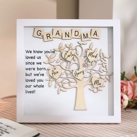 PRICES MAY VARY. 💗【Best Grandma Gift】Our Family Shadow Box is the perfect gift for Grandma on any occasion. This personalized Christmas gift is sure to bring a smile to your grandparent's faces 💗【Unique Design】Christmas gift is a 12x12" shadow box that includes a raised wooden tree with 20 wooden hearts, 10 gems and 20 invisible glue dots. These wooden hearts make it very easy to write your grandchildren's names or glue their pictures on, making it the perfect way to personalize your Christmas Faces Unique, Scrabble Crafts, Clip Picture Frame, Family Tree Frame, Family Picture Frames, Tree Frame, Personalized Grandma Gifts, Gift For Grandparents, Mothers Day Decor