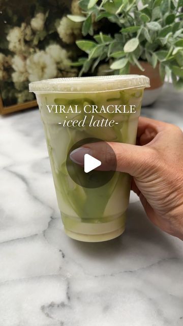 Ashley McCrary on Instagram: "The Viral Crackle Iced Latte did not disappoint. I put a twist on it and instead of using milk chocolate and coffee, I did white chocolate, matcha, and freeze-dried strawberries. I am going to crave this daily.....it’s so good!  1/4 cup white chocolate chips, melted 1 teaspoon of matcha powder 2 ounces of hot water  2 tsp coconut oil (to melt the chocolate with) 1 cup milk (dairy or non-dairy like almond, soy, or oat milk) Sweetener to taste (optional) 1-2 teaspoon vanilla syrup (optional) 2 tbsp freeze-dried strawberries  Coat the inside of a plastic cup with melted white chocolate. Add to the fridge or freezer for 5 minutes to harden. Mix the matcha powder with the hot water and froth the milk. Mix the matcha, milk, sweetener of choice and vanilla syrup. Add White Chocolate Matcha, Melted White Chocolate, Chocolate Crackles, Matcha Milk, Milk Dairy, Chocolate And Coffee, The Matcha, Vanilla Syrup, Freeze Dried Strawberries