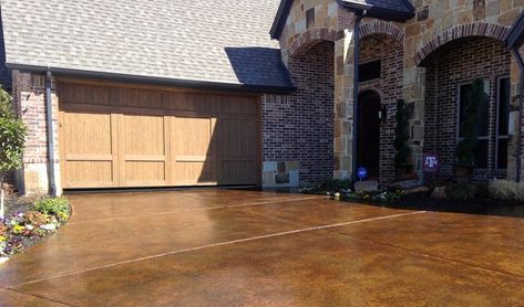 Stained Concrete Driveway Complements Brick and Stone Resurfaced Concrete, Stained Concrete Driveway, Decorative Concrete Driveways, Cement Driveway, Concrete Stain, Acid Stained Concrete, Dark Trim, Acid Stain, Brick And Wood