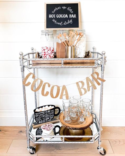 Modern Hot Cocoa Bar, Hot Chocolate Trolley, Rustic Hot Chocolate Bar Ideas, Elegant Hot Chocolate Bar, Hot Cocoa Bar Cart Ideas, Hot Coco Bar Cart, Hot Coco Cart, Hot Cocoa Cart Ideas, Farmhouse Bar Cart Decor