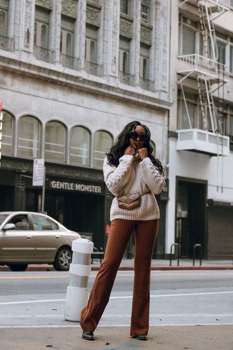 Oversized Knits and Flares | A Fall Uniform Brown Flares Outfit, Cable Sweater Outfit, Brown Flare Pants Outfit, Knit Pants Outfit, Cable Knit Sweater Outfit, Flare Outfit, Brown Flare Pants, Brown Pants Outfit, Brown Cable Knit Sweater