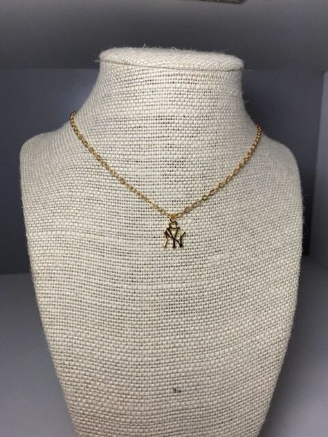 Excited to share the latest addition to my #etsy shop: New York Yankees Necklace https://etsy.me/3BJWbqt #gold #sportsfitness #unisexadults #lobsterclaw #rolo #nyyankees #newyorkyankees #yankees #yankeesnecklace Yankee Necklace, Yankees Necklace, Sun And Moon Necklace, Charm Necklaces, Ny Yankees, Oils For Skin, How To Apply Makeup, Gold Filled Jewelry, Gold Filled Chain