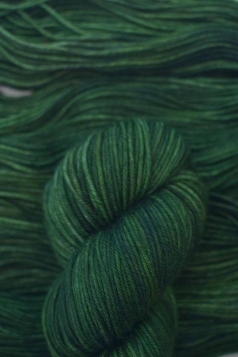 *Please reach out for large project quantity orders!* Hand dyed high quality yarn in a colorway of variegated green, with tones leaning into forest and leaf green.  I set out to dye the perfect green for my husband to wear; rich but not too olive.  To me this is the perfect neutral dark green reminiscent of pine trees and the deep woods! This yarn is hand dyed by me on mulesing-free fine merino superwash wool yarn (or a blend of other fibers, if you choose!) This yarn is incredibly soft and squishy and is great for close-to-body wear as well as anything else you can dream up! Because of the handmade process, each hank of yarn is one of a kind. Please expect some variation from skein to skein, even from the same dye lot. This is what makes hand dyed yarn so wonderfully unique!  If making a Deep Woods, Hand Dyed Wool, Silk Lace, Leaf Green, Pine Trees, Hand Dyed Yarn, Yarn Colors, Mulberry Silk, Wool Yarn