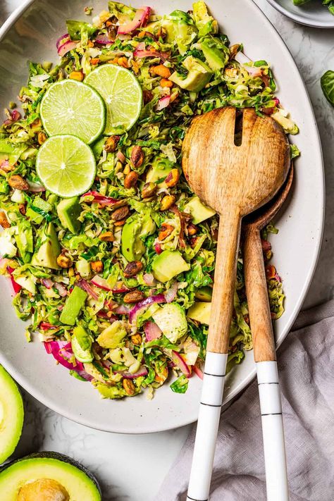 This warm shaved Brussels sprouts salad is packed with creamy avocado, crunchy pistachios, and tossed in a zesty dressing that brings all the flavors to life! It’s a side dish that’s as delicious as it is satisfying. #brusselssprouts #salad #sidedish Shaved Brussel Sprout Salad, Shaved Brussel Sprouts, Slow Cooker Turkey Chili, Brussels Sprouts Salad, Pistachio Salad, Chicken Curry Salad, Warm Salad, Sprouts Salad, Brussel Sprout Salad