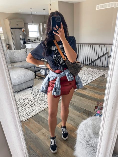 Tshirt Outfit With Sneakers, Sneakers With Mini Skirt, Mini Skirt And Band Tee Outfit, Mini Skirts With Sneakers, Skirts And Band Tees, Leather Skirt And Band Tee Outfit, Plaid Skirt Concert Outfit, Red Skirt Concert Outfit, Vans And Skirts Outfit