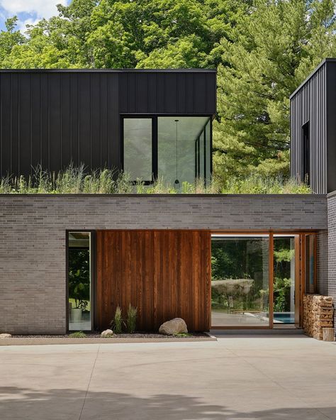 Brick Wood House Exterior, Metal Sided House, Modern Wood Siding, Wood And Brick House Exterior, Black And Wood House Exterior, Brick And Wood Exterior, Modern Addition To Old House, Wood And Concrete House, Timber Home Exterior